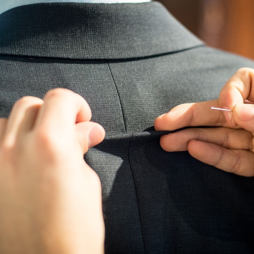 Tailor working on alteration